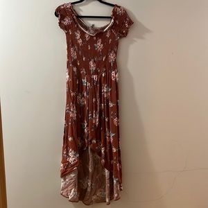 kind of a burnt orange color with flowers, size 2XL.